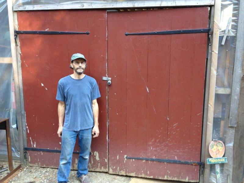 Local boat builder David Stimson stands in front of his padlocked barn on the River Road. RYAN LEIGHTON/Boothbay Register
