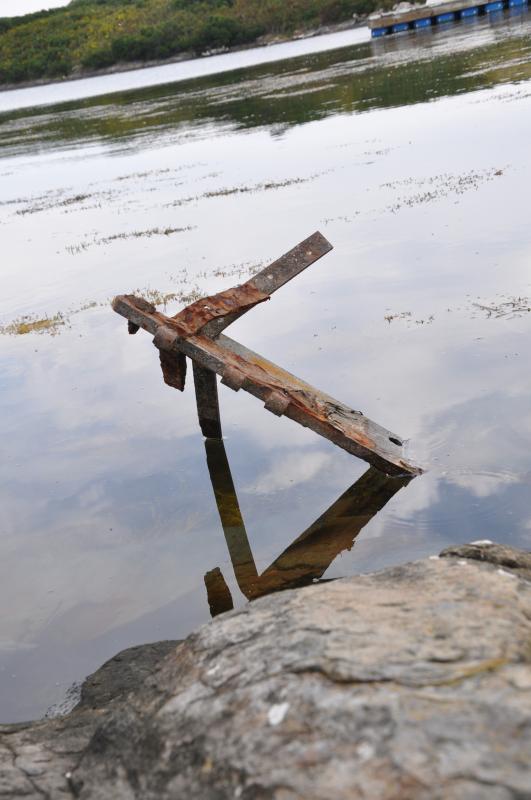 A rusted piece of metal is all that remains of a ship near where the drying racks were once located. BEN BULKELEY/Boothbay Register A rusted piece of metal is all that remains of a ship near where the drying racks were once located. BEN BULKELEY/Boothbay Register