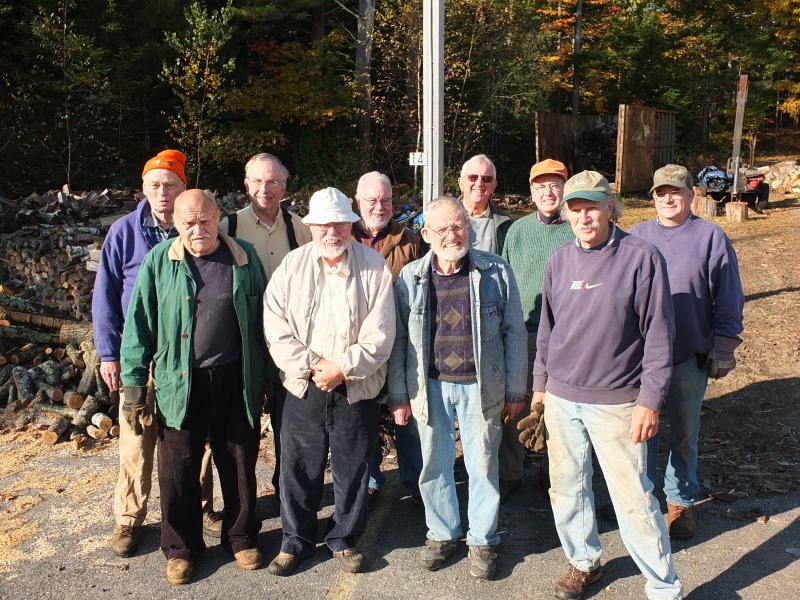 The busy workers of the Woodchucks briefly halt operations for a photo. The all-volunteer service group made up of local retirees work year-round to provide wood used to heat the homes of families in need. Pictured back row left are, Leo Barter Sr., Denny Wilson, Greg Holton, Ham Meserve, Maurice Landemare and Bill Smith. Front Row left, John King, Henry C. Rowe, Barclay Shepard and Doug Fowle. RYAN LEIGHTON/Boothbay Register