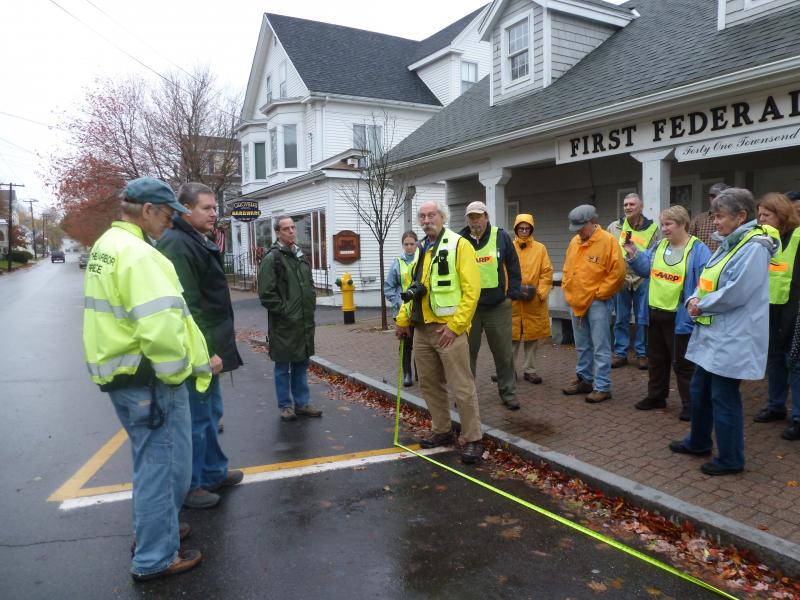 Dan Burden talks about the benefits of smaller parking spaces in front of First Federal Savings on Townsend Avenue. KATRINA CLARK/Boothbay Register. Below: A small work group map shows ideas from the community. Courtesy of Friends of Midcoast Maine