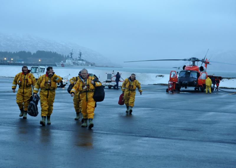 Kulluk's crew members Air Station Kodiak following a Coast Guard rescue and a ride in an MH-60 Jayhawk helicopter. Photo courtesy of Petty Officer 3rd Class Jonathan Klingenberg