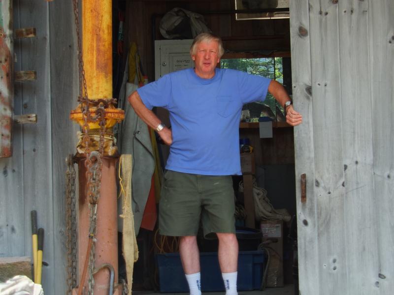 BILL ROYALL stands in the entrance of his studio in Southport. SUZI THAYER/Boothbay Register 