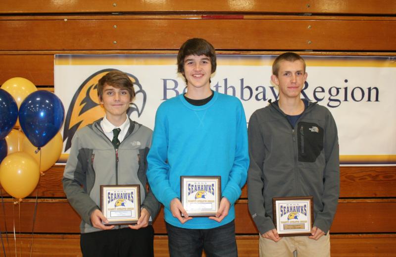 Boys cross-country plaque winners, from left, Robert Campbell, Coaches Award; Jack Hasch, Most Improved; Benn Scully, Most Valuable. KEVIN BURNHAM/Boothbay Register Boys cross-country plaque winners, from left, Robert Campbell, Coaches Award; Jack Hasch, Most Improved; Benn Scully, Most Valuable. KEVIN BURNHAM/Boothbay Register