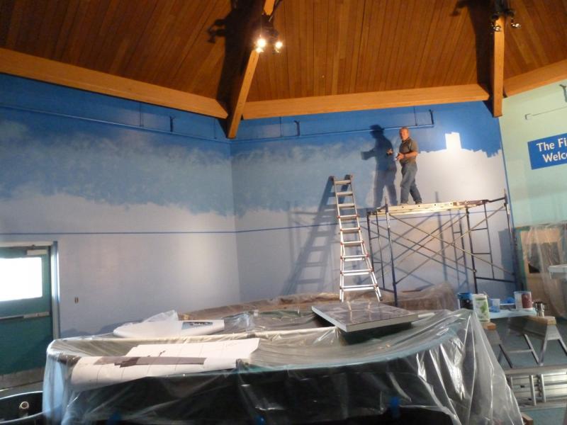 This is artist Bob McKay's ultimate canvas: walls inside the Maine State Aquarium. LISA KRISTOFF/Boothbay Register Robert B. McKay