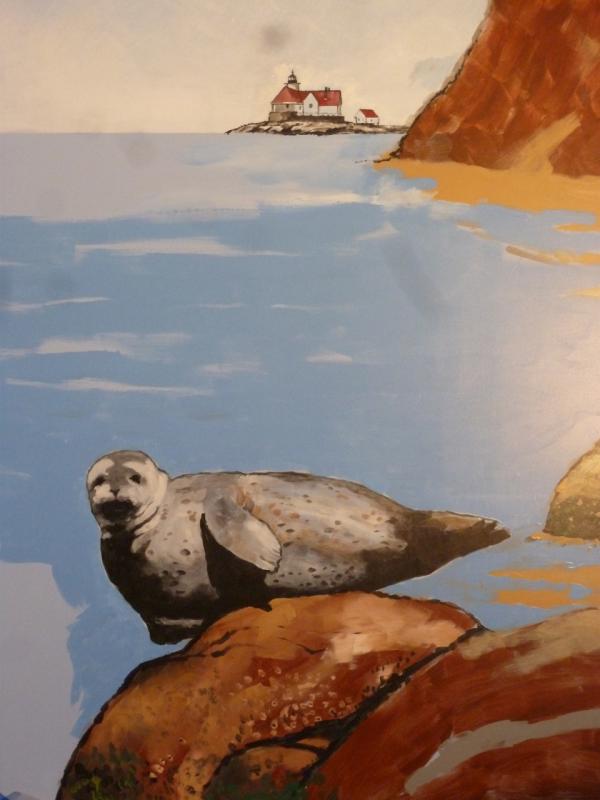 A baby seal will appear to be peering down into the touch tank in the Maine State Aquarium mural by Bob McKay. LISA KRISTOFF/Boothbay Register Robert B. McKay
