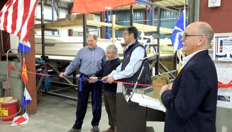 Tim Hodgdon, third from left, assists with the ribbon-cutting at Hodgdon Yachts’ new Damariscotta Facility. RYAN LEIGHTON/Boothbay Register