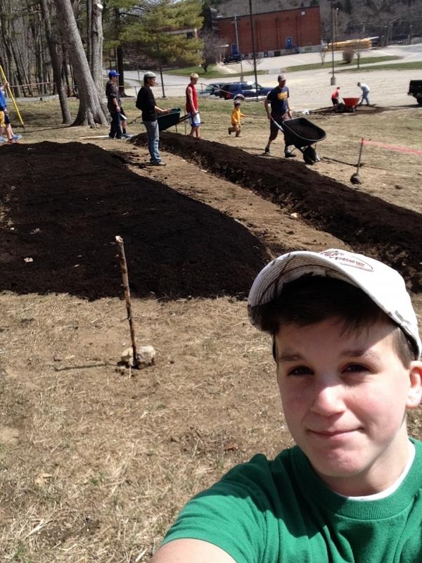 Freshman Riley Spear with his crew in the background. Courtesy of Bryan Dionne