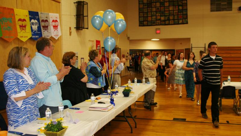 The BRHS Class of 2014 enters the Boothbay Region Elementary School gym at the start of the Alumni Banquet. KEVIN BURNHAM/Boothbay Register