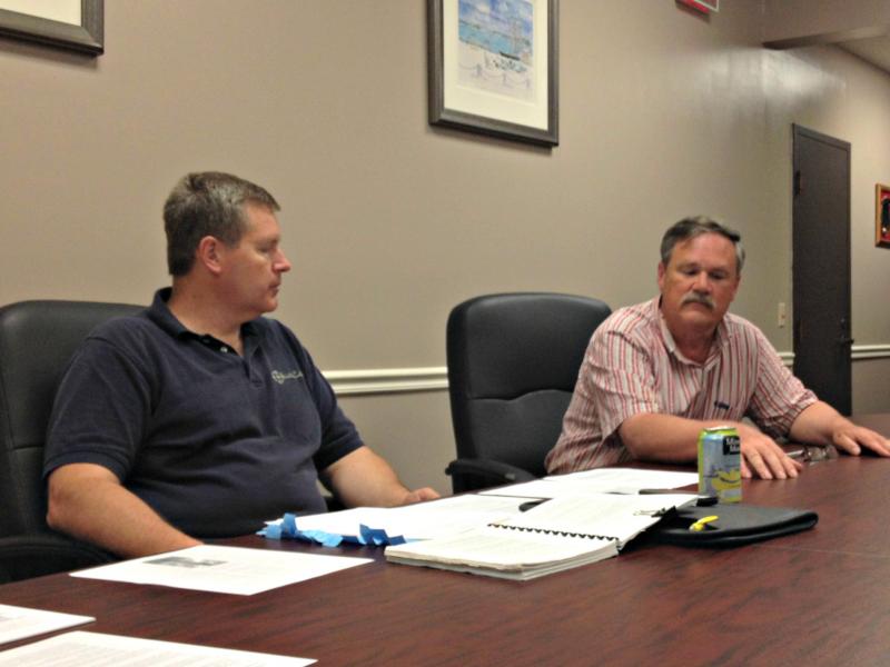 Board Chairman Michael Tomko, left, listens to planning board member Andy Shepard discuss needing rules for non-compliant parking areas similar to rules for non-compliant shoreland zones. “We’ve been flying by the seat of our pants here and that’s never good,” Shepard said. KATRINA CLARK/Boothbay Register