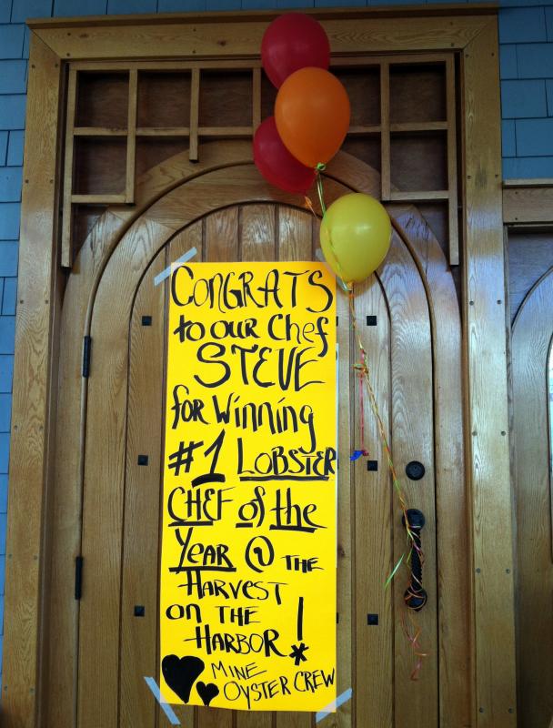 This sign was placed on the door of The World is Mine Oyster after Steve Richards’ big win in Portland on Friday. SUZI THAYER/Boothbay Register
