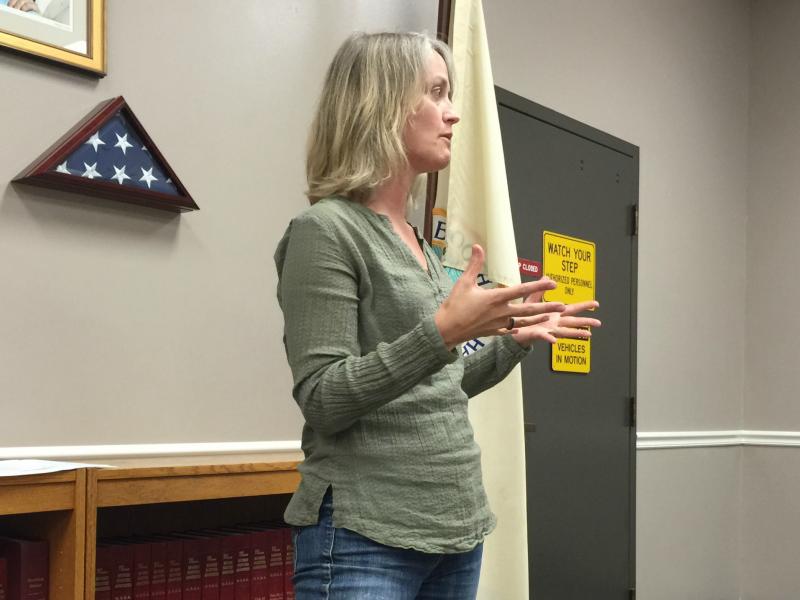 Civil Engineer Danielle Betts of Knickerbocker Group presents two ideas for a redesign of the former tennis court area to the town selectmen June 8. Both ideas include basketball courts and more green space. KATRINA CLARK/Boothbay Register