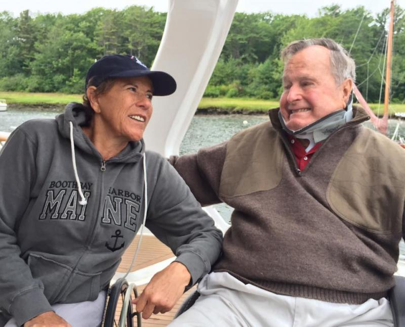 Former president George H. W. Bush warmed up to Deborah Mellen’s friendly, outgoing manner on-board her boat, the Impossible Dream. Courtesy of Harry Horgan