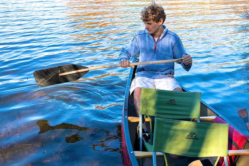 Joe Paolillo tests the paddle on Knickerbocker Lake. Courtesy of the Boothbay Paddle Company.