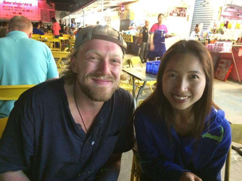 Chauncey Erskine and A of the FTD program celebrate at the Chiang Rai night market. Courtesy photo