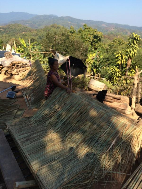 Footage from an Akha village in Northern Thailand shows Mee’s mother assembling thatched roof sections to sell. Courtesy photo