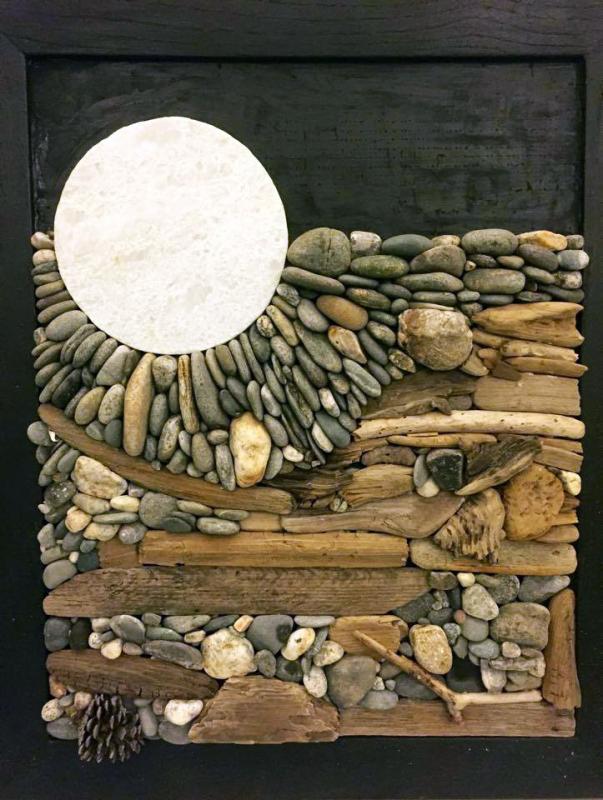 A stone, marble and driftwood relief by Joe Norton. Courtesy of Joe Norton Stone