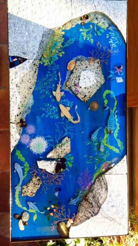 Joe Norton and his mother, Sanni Norton, collaborated on this painted and stonework table. Courtesy of Joe Norton Joe and Sanni
