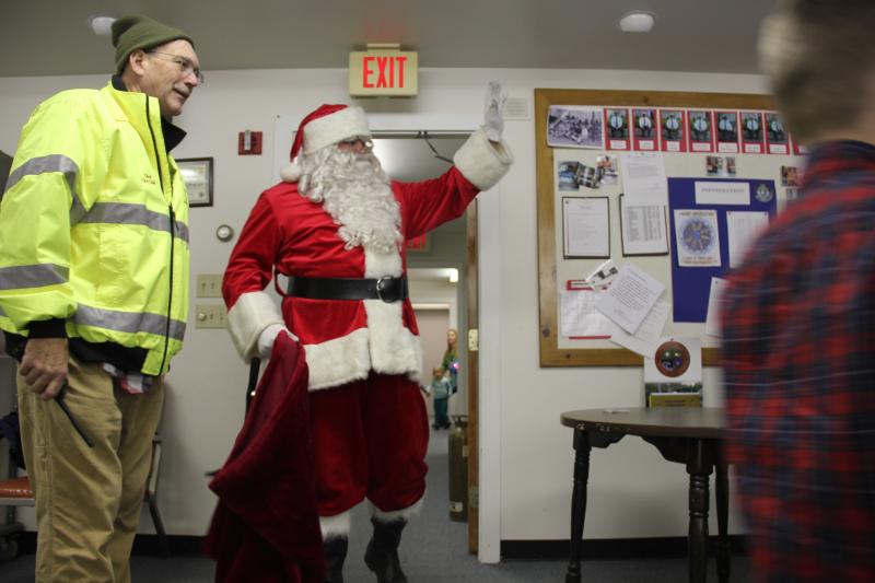 The Big Guy makes a big entrance. DIANE DORBIN/Boothbay Register Santa entrance Boothbay