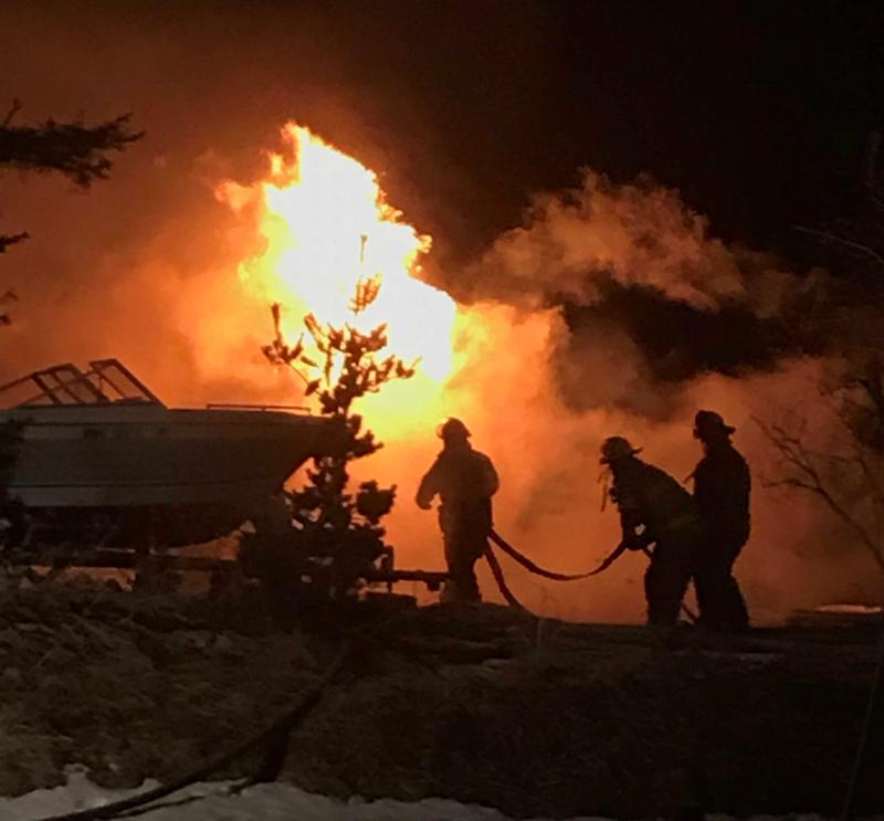 Firefighters battle the fire at 12 Matthews Road on Tuesday morning. Courtesy of Emily Mirabile