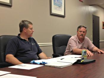 Board Chairman Michael Tomko, left, listens to planning board member Andy Shepard discuss needing rules for non-compliant parking areas similar to rules for non-compliant shoreland zones. “We’ve been flying by the seat of our pants here and that’s never good,” Shepard said. KATRINA CLARK/Boothbay Register
