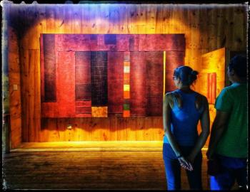 “Strangers Tent” by George Mason. This 87 by 104-inch relief tapestry was displayed in the Darrow’s Barn this summer during Salt Bay Chamberfest concerts. Mason exhibited it there to answer the question: Would the art heighten the overall experience of concert audiences (two mediums in one space) and would part of that experience be because it appeared in an unexpected setting? Courtesy of George Mason Strangers Tent by George Mason