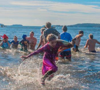 In like a sprinter. Out like a sprinter. DIANE DORBIN/Boothbay Register Penguin Plunge 2017