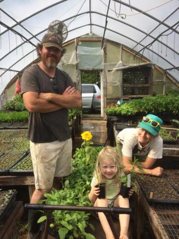 Brady Hatch, right, with her husband Brendan McQuillen and daughter, Clodaugh, show off some of the Thai chili plants they are growing in support of Friends of Thai Daughters. Courtesy photo