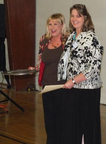  Ginny Bishop, left, receives the Character Development Award from presenter Anne Barker. RYAN LEIGHTON/Boothbay Register