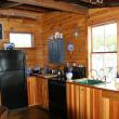 The kitchen has hand-built cabinets and modern appliances. SUZI THAYER/Boothbay Register