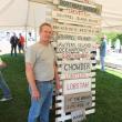 Ed Phelps sells his rustic local signs, made from reused fence posts and old oars. RYAN LEIGHTON/Boothbay Register