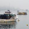 FOG ADDS A SENSE OF SERENITY to this midsummer Boothbay Harbor morning. GARY DOW/Boothbay Register