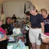 The Boothbay Railway Village was the perfect place for book lovers on Saturday. The Boothbay Harbor Memorial LIbrary's ninth annual Books in Boothbay summer book fair hosted 40 Maine authors and featured truckloads of books with a local flavor. SUE MELLO/Boothbay Register.