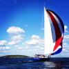 The Gitana flies a striped spinnaker with the southwesterly winds off of Damariscove Island.  RYAN LEIGHTON/ Boothbay Register 