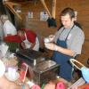 Denislav Sotirov serves Boothbay Lobster Wharf’s chili at the Chili & Chowder contest. GARY DOW/Boothbay Register