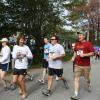 Win Mitchell, right, from Boothbay Craft Brewery, runs with a big smile as the race starts. NICOLE LYONS/Boothbay Register