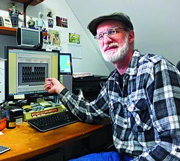 Guy Marsden can monitor how much energy his home uses and how much his family saves by using available sunlight. JOHN MAGUIRE/Wiscasset Newspaper