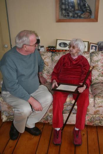 Evelyn Hartung Keene being presented with the Boston Post Cane on December 10 of 2007, talking with then-chairman of the Boothbay Harbor Board of Selectmen, Louis Burnham. KEVIN BURNHAM/Boothbay Register
