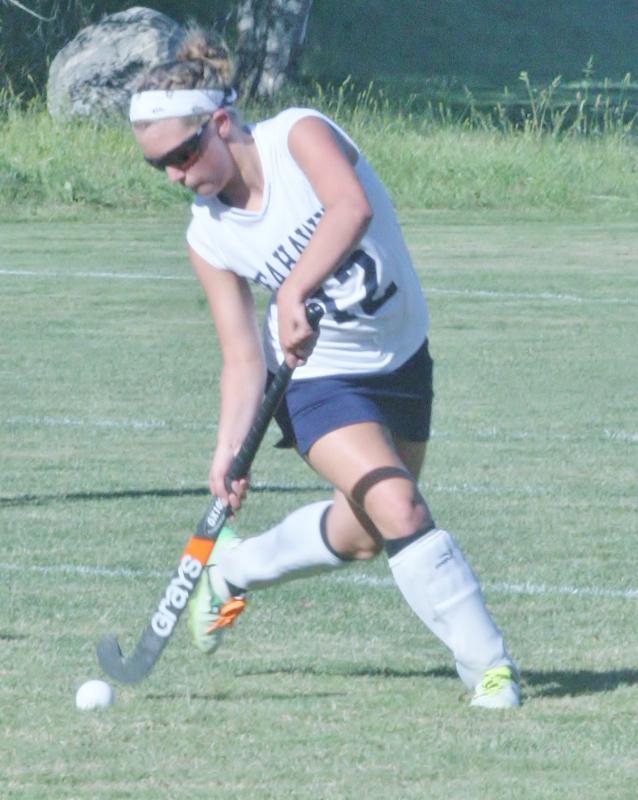 Tori Schmid, a junior on the Lady Seahawks field hockey team, dribbles the ball up-field. KEVIN BURNHAM/Boothbay Register Tori Schmid, a junior on the Lady Seahawks field hockey team, dribbles the ball up-field. KEVIN BURNHAM/Boothbay Register
