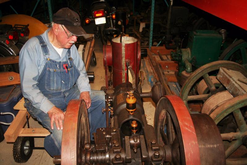 Robert Meixell, a collector of antique farm engines and co-founder of the Maine Antique Power Association, restores engines from his Westport Island homestead. Below, Meixell's workshop is a maze of antique engines once used to operate well pumps and other farm machinery. JOHN MAGUIRE/Wiscasset Newspaper JOHN MAGUIRE/Wiscasset Newspaper Robert Meixell, a collector of antique farm engines and co-founder of the Maine Antique Power Association, restores engines from his Westport Island homestead. JOHN MAGUIRE/Wiscasset Newspaper