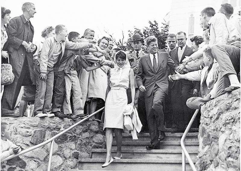 President John F. Kennedy and his sister, Patricia Kennedy Lawford, thronged by well-wishers as he leaves the 10 a.m. Sunday mass at Our Lady Queen of Peace in Boothbay Harbor on Aug. 12, 1962. Courtesy of Tom Carbone Archives 