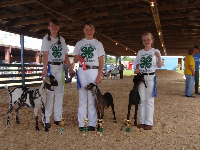 Soairca Bogard, Nicole, and Caitlyn Spear with goats. Soairca Bogard, Nicole, and Caitlyn Spear with goats.