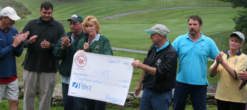 Brenda Blackman presents a check to Special Olympics Maine at the Boothbay Charities Classic Open in 2008. Courtesy of the Boothbay Charities Classic committee Brenda Blackman presents a check to Special Olympics Maine at the Boothbay Charities Classic Open in 2008. Courtesy of the Boothbay Charities Classic committee