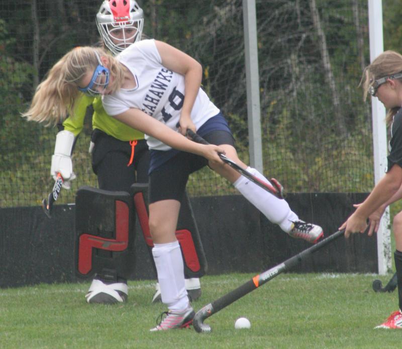 Samantha Carter clears the ball in front of goalie Madison McCarthy during Friday's game at home against Lisbon. KEVIN BURNHAM/Boothbay Register Samantha Carter clears the ball in front of goalie Madison McCarthy during Friday's game at home against Lisbon. KEVIN BURNHAM/Boothbay Register