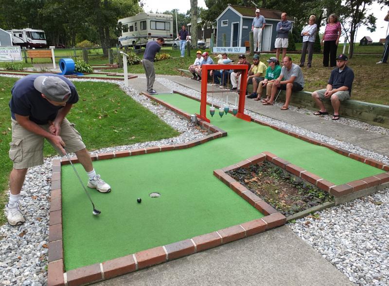 Elmer Lawson shoots for a birdie on the 15th hole in front of a crowd of onlookers. RYAN LEIGHTON/Boothbay Register Elmer Lawson shoots for a birdie on the 15th hole in front of a crowd of onlookers. RYAN LEIGHTON/Boothbay Register