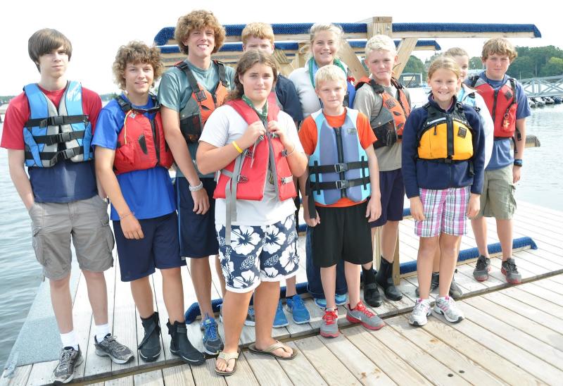 The 2012 Boothbay Region High School sailing team returns several sailors to the water this year. With several returning sailors, Coach Sally Lloyd said she expects big things from this year’s team. Back row, from left are Caleb Colby, Hayden Wright, Sherm Brewer, Liam Conlin, Coach Sally Lloyd, Myron Hahn, Jessica Murphy, Jake Brewer; front row, from left are Ben Betts, Nolan Conlin and Madison Gaudette. BEN BULKELEY/Boothbay Register The 2012 Boothbay Region High School sailing team returns several sailors to the water this year. With several returning sailors, Coach Sally Lloyd said she expects big things from this year’s team. Back row, from left are Caleb Colby, Hayden Wright, Sherm Brewer, Liam Conlin, Coach Sally Lloyd, Myron Hahn, Jessica Murphy, Jake Brewer; front row, from left are Ben Betts, Nolan Conlin and Madison Gaudette. BEN BULKELEY/Boothbay Register