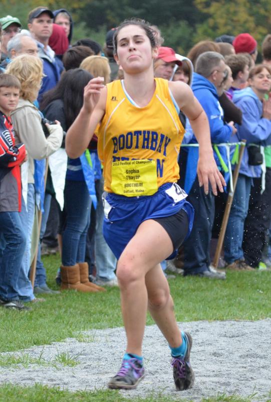 Sophia Thayer charges in at the end of girls' seeded race. Thayer placed nineteenth out 239 runners with a time of 21:22. Courtesy of Aquilino Alamo Sophia Thayer charges in at the end of girls' seeded race. Thayer placed nineteenth out 239 runners with a time of 21:22. Courtesy of Aquilino Alamo
