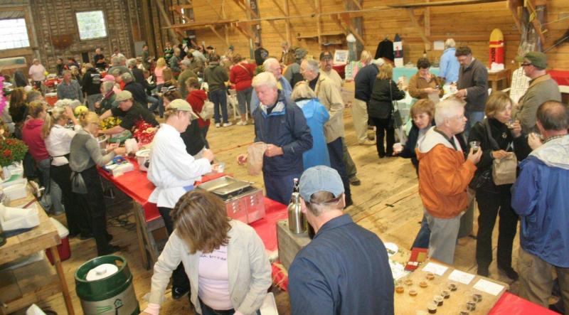 The massive boat shed at Boothbay Harbor Shipyard provide plenty of room for the 350-plus attendees at Harbor Fest's Chowder and Chili Challenge. Clockwise: Kelly Flynn, left, and Holly Stover dish out Brown's Wharf first-place chili, made by Micah Jones. Craig Andrews, owner/operator of Andrews' Harborside Restaurant, gets ready for the Chowder and Chili Challenge. KEVIN BURNHAM/Boothbay Register See Photo Gallery for more photos The massive boat shed at Boothbay Harbor Shipyard provide plenty of room for the 350-plus attendees at Harbor Fest's Chowder and Chili Challenge.