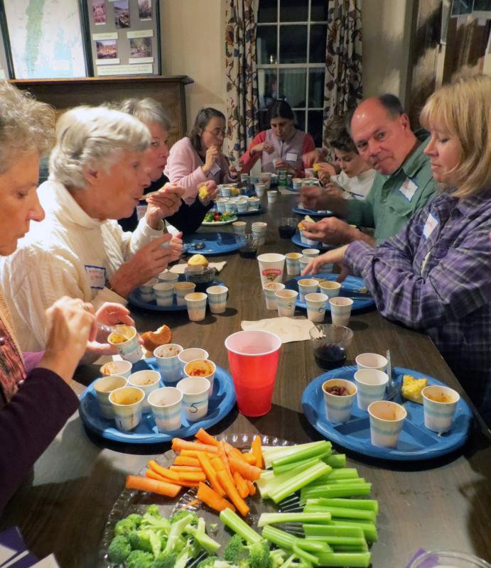Volunteers try to pick their favorite chili at the annual volunteer appreciation celebration. Courtesy of Sheepscot Valley Conservation Association Volunteers try to pick their favorite chili at the annual volunteer appreciation celebration. Courtesy of Sheepscot Valley Conservation Association