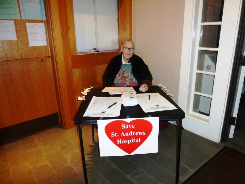 June Phillips mans the St.Andrews petition table in the town office lobby. June Phillips mans the St.Andrews petition table in the town office lobby.