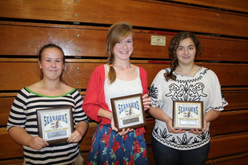 Girls' Soccer plaque winners, from left, Dana Greenleaf, most improved; Sinead Miller, most valuable; and Mikayla McFetridge, coaches award. KEVIN BURNHAM/Boothbay Register Girls' Soccer plaque winners, from left, Dana Greenleaf, most improved; Sinead Miller, most valuable; and Mikayla McFetridge, coaches award. KEVIN BURNHAM/Boothbay Register